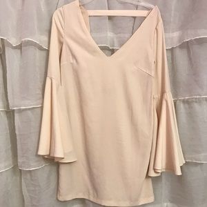 cream-colored long sleeve flowy mini dress